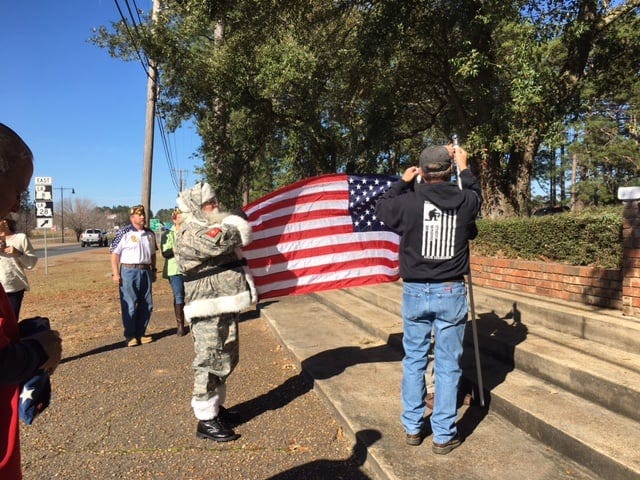 The Vernon Parish Chamber received a new flag and VFW Post 3106 helped with the official replacement.