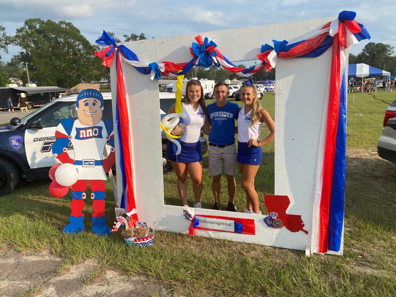 A trio of DeRidder Dragons were all smiles at National Night Out 2021