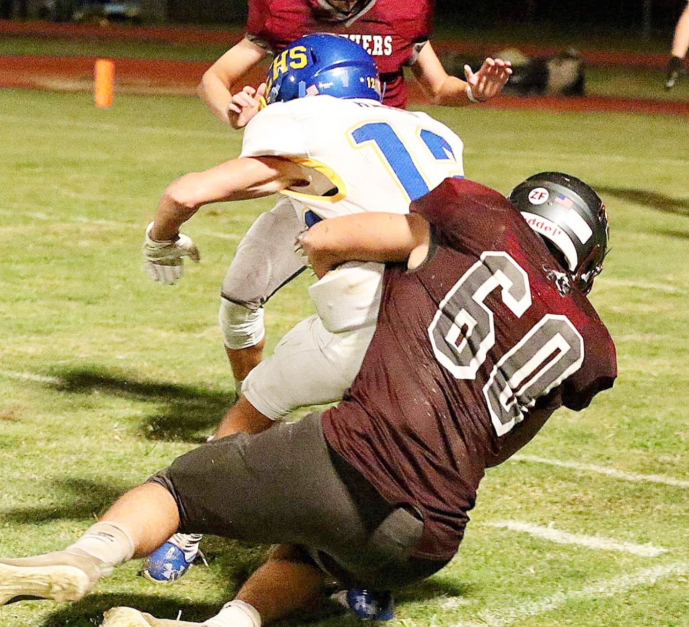 Merryville's Tyler Belcher (60) brings down a runner during a recent Panther loss. Belcher and the Panthers found themselves on the wrong end of the scoreboard on Thursday, falling to Grand Lake, 34-0.
