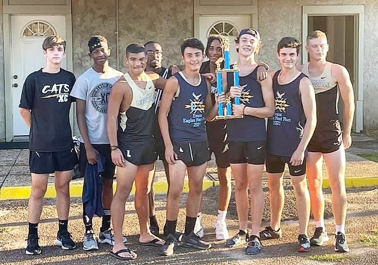 The Rosepine Lady Eagles and Leesville Wampus Cats brought home championship gold on Wednesday as they won at the annual Evans Eagles Nest Run.