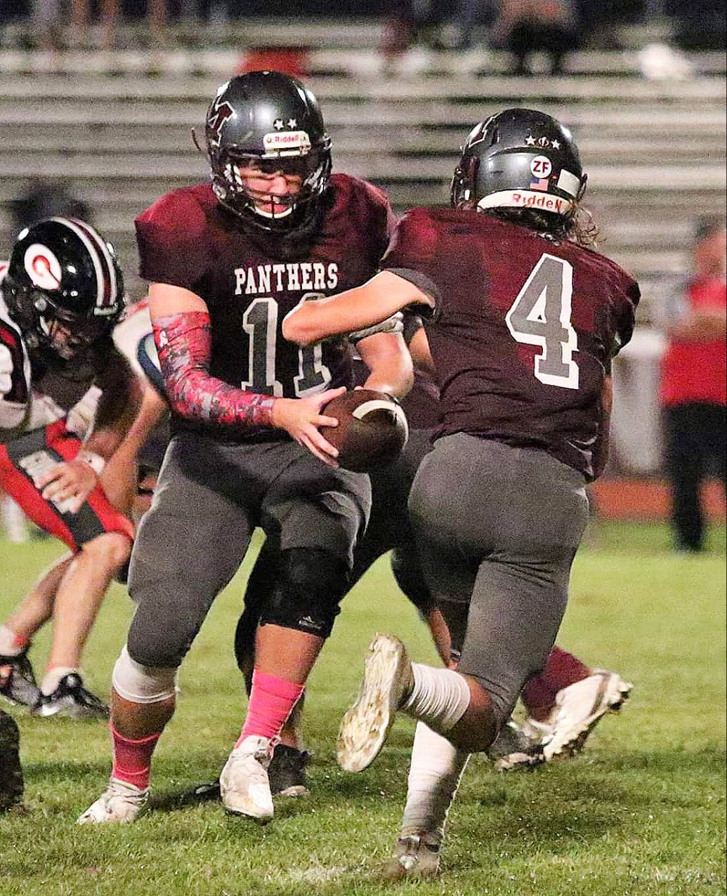Merryville quarterback Remington Coody (11) hands the ball off to Kaleb Lewis (4) on the razor jet sweep last week against Gueydan. The Panthers host Basile at 7 p.m. Thursday night at Keener-Cagle Stadium.